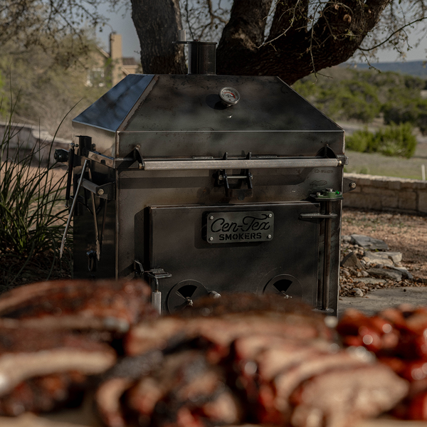 Handmade backyard bbq smoker with direct-heat.