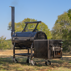A handmade, offset BBQ smoker in a backyard. 