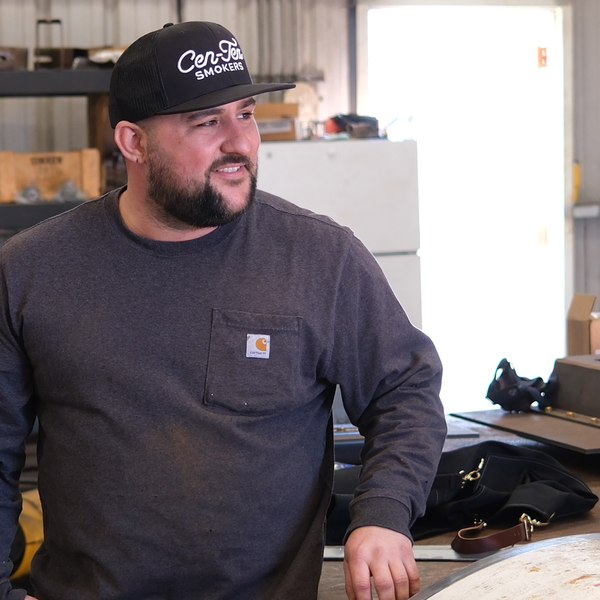 Classic black Cen-Tex Smokers snapback trucker hat, breathable and stylish headwear for Texas BBQ fans.