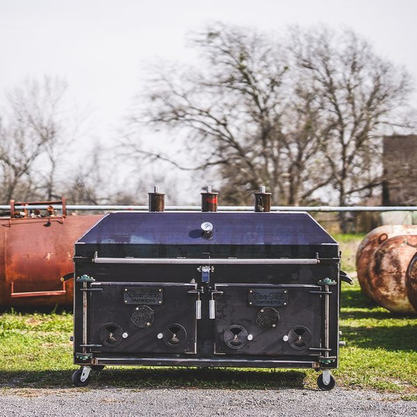 Cen-Tex Smokers Lowcountry Cooker using direct-heat smoke for traditional whole hog BBQ and deep smoke flavor.