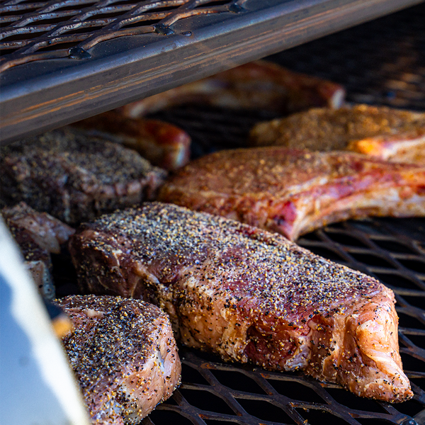 How to smoke steaks in a backyard bbq pit. 